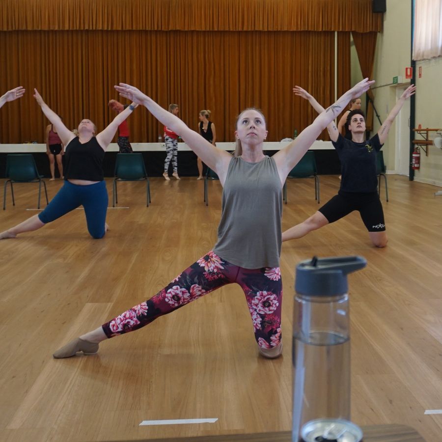 Performing company dancers in rehearsal.  A sprung floor with tarket surface is important for floor work as well as for jumping.  Floor work on the wrong floor can result in friction burns or splinters